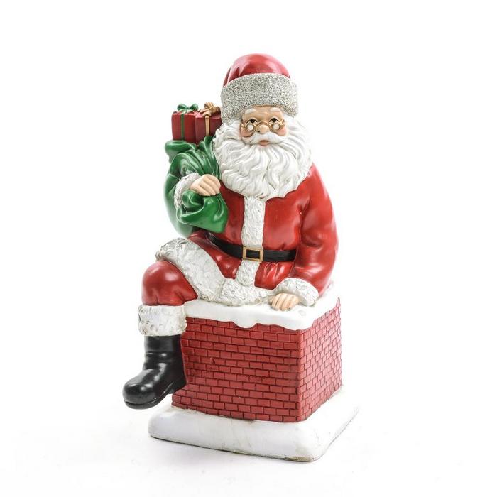 Babbo natale su camino in resina per decorazione 31 cm