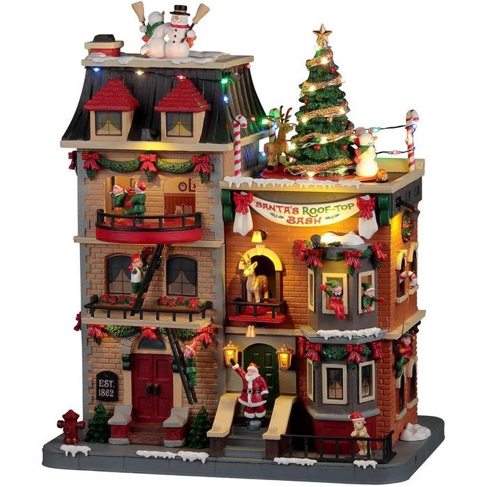 Casetta natalizia con Babbo Natale per villaggio natalizio