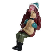 Scena bacio ai cuccioli per villaggio natalizio