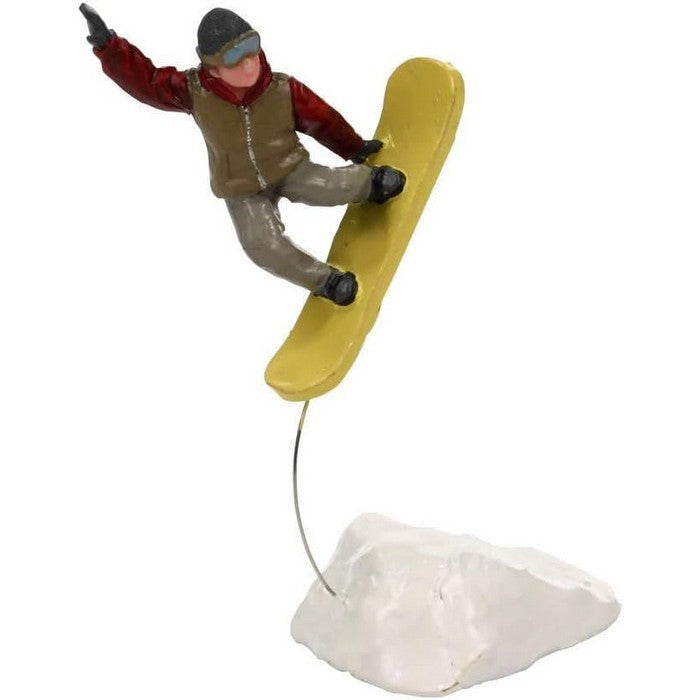 Trucchetto con lo snowboard per villaggio natalizio