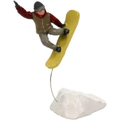 Trucchetto con lo snowboard per villaggio natalizio