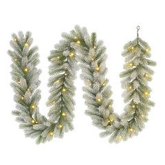 Ghirlanda verde innevata in PE con LED bianco caldo 270 cm