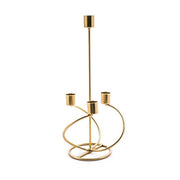 Candelabro in metallo dorato