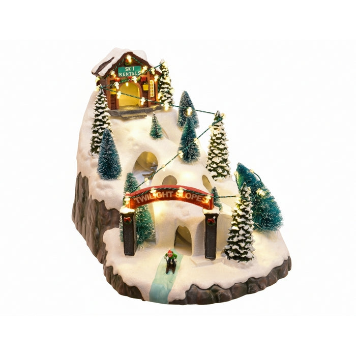 Scena natalizia con pista da sci, movimento e luce a LED