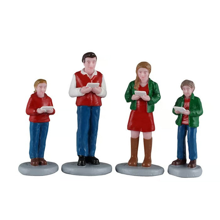 Famiglia che canta  per villaggio natalizio