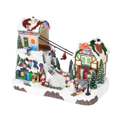 Villaggio natalizio in poliresina con musica, movimento e LED, con funivia 39 cm