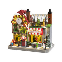 Scenario per villaggio natalizio in poliresina Gift Shop con musica, movimento e LED 44 cm