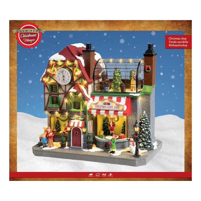 Scenario per villaggio natalizio in poliresina Gift Shop con musica, movimento e LED 44 cm