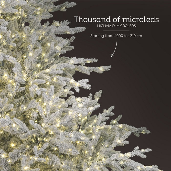 Albero di Natale innevato in PE/PVC effetto realistico con microLED, telecomando, timer - Prestige